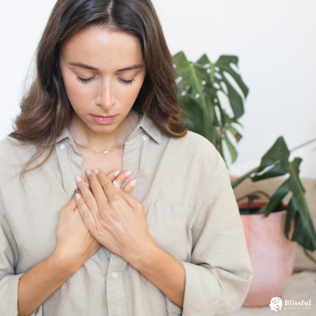 Woman with Hands on Heart - Somatic Therapy and Self-Compassion