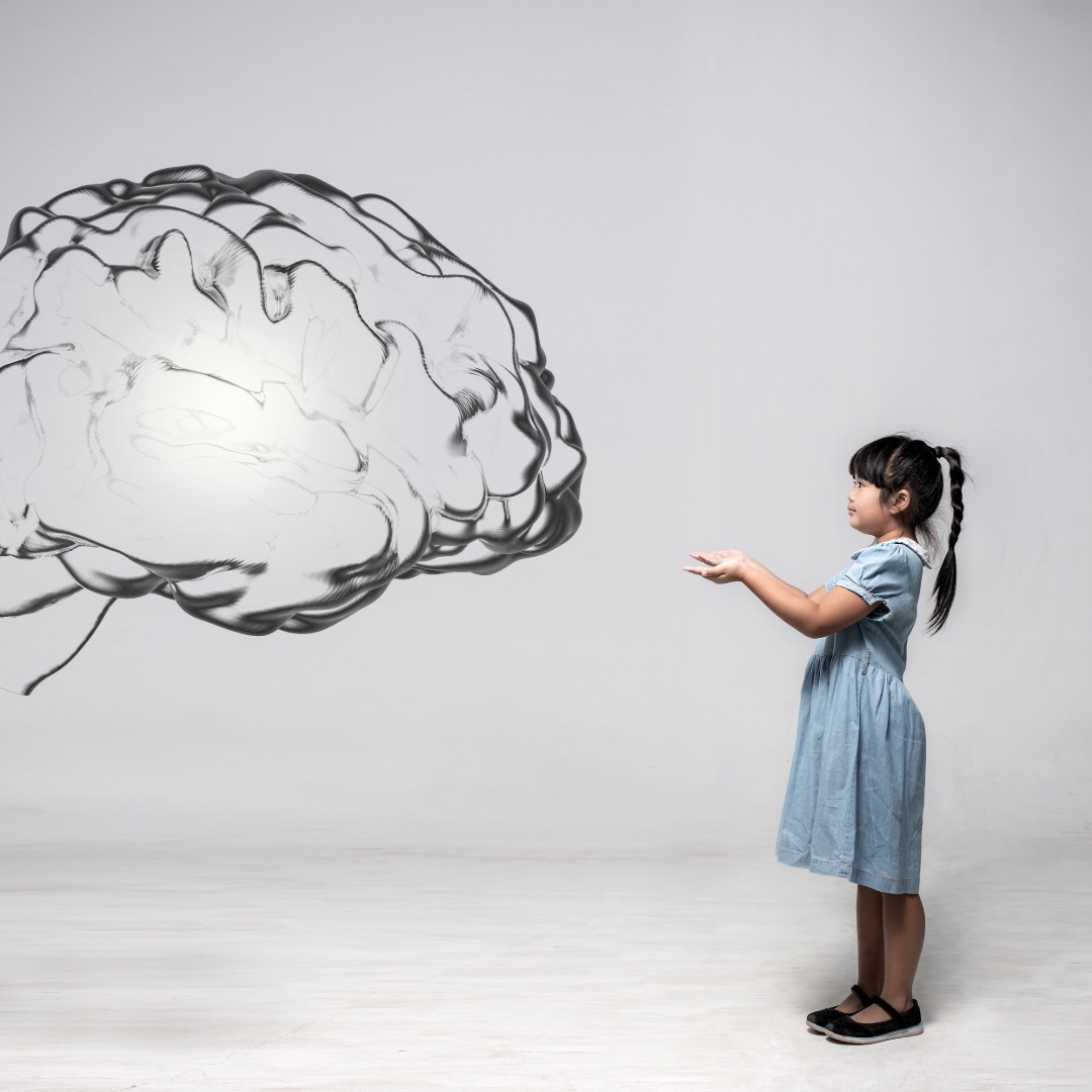 Girl looking at an animated mind representing somatic healing and therapy